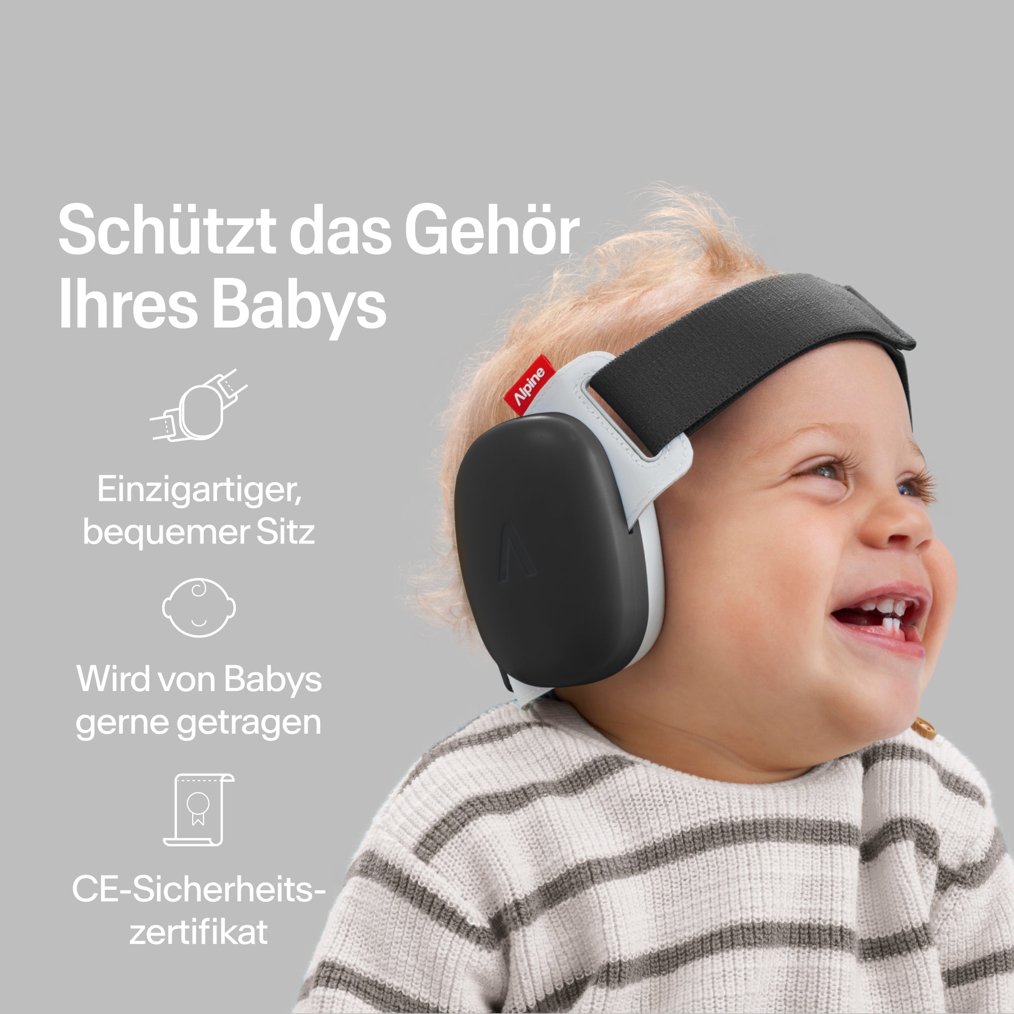 Fröhliches Baby trägt Alpine Gehörschutz black, sicherer Sitz, CE-zertifizierter Gehörschutz