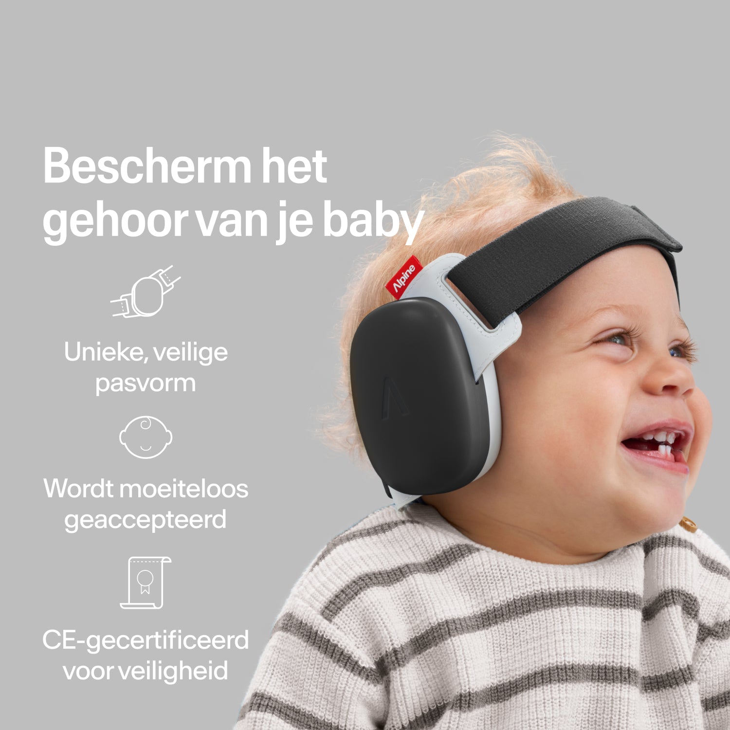 Blije baby draagt black Alpine oorkappen met stevige pasvorm, CE-gecertificeerde gehoorbescherming
