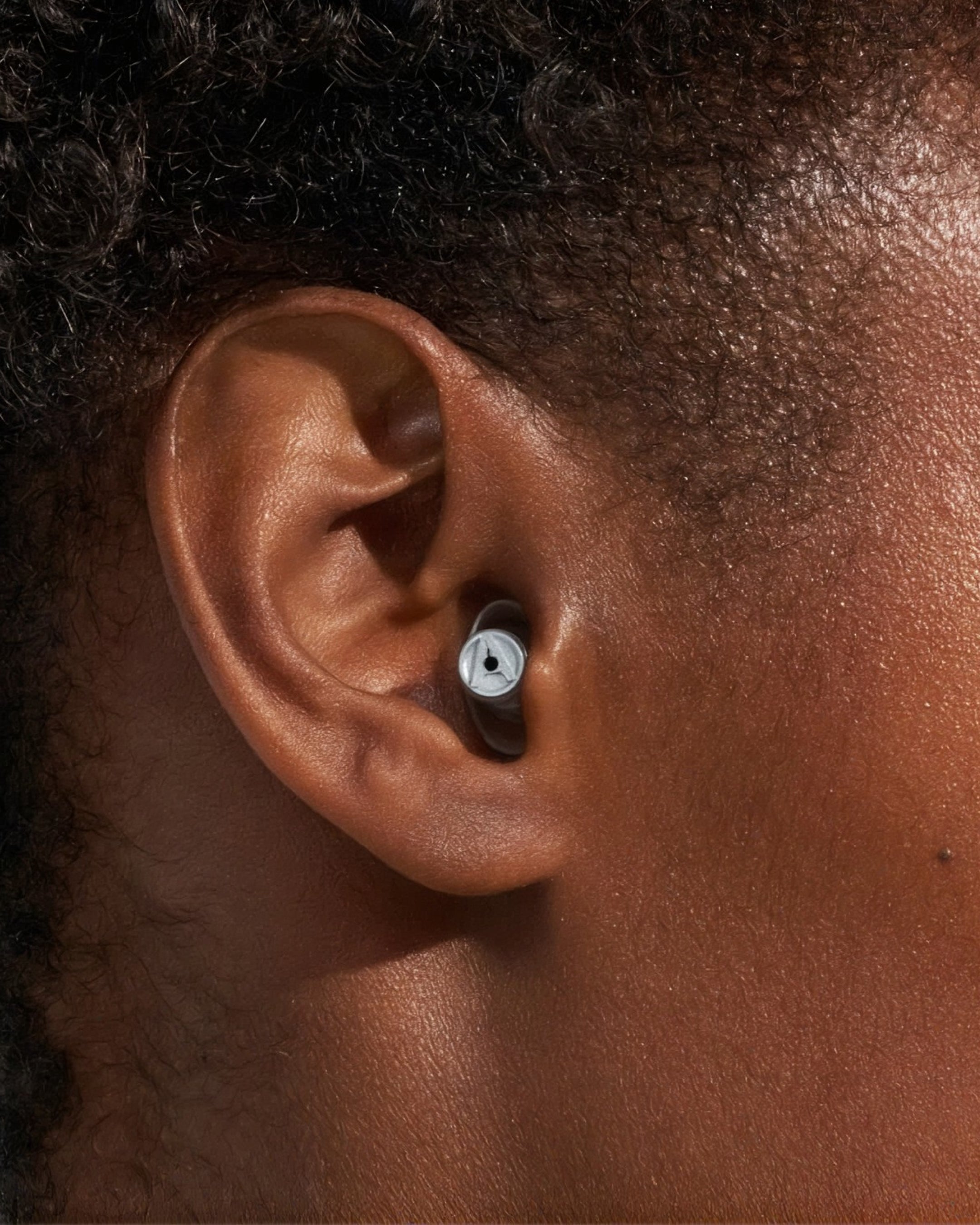 Close-up of Alpine MusicSafe in ear