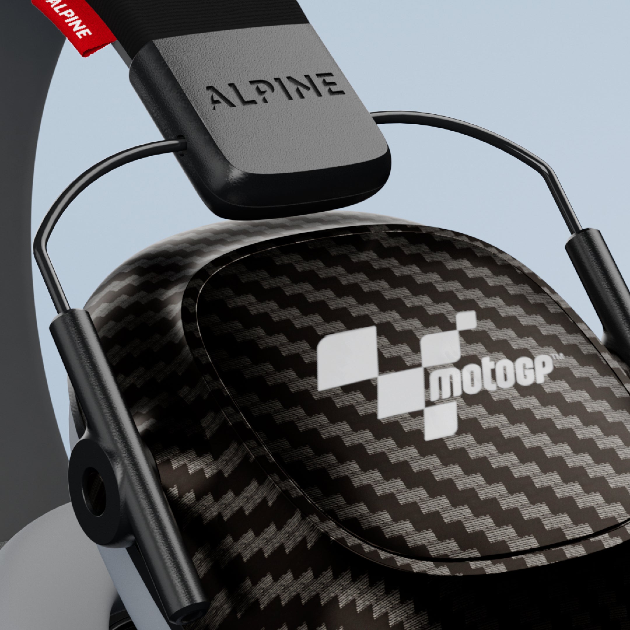 Close-up of an Alpine MotoGP Racing Muffy ear cup with MotoGP logo and Alpine headband 